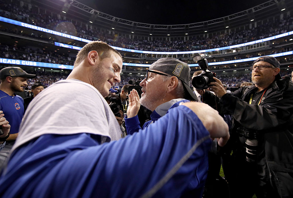 CLEVELAND, OH - NOVEMBER 02:  Anthony Rizzo #44 celebrates with manager Joe Maddon of the Chicago Cubs after defeating the Cleveland Indians 8-7 in Game Seven of the 2016 World Series at Progressive Field on November 2, 2016 in Cleveland, Ohio. The Cubs win their first World Series in 108 years.  (Photo by Ezra Shaw/Getty Images)